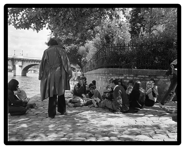 France Paris - Students gather on the banks of the River Seine