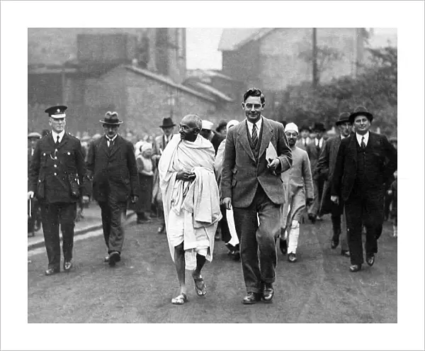 Gandhi seen here during his tour of the Lancaster cotton mills during September 1931