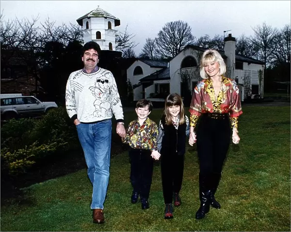 Bob Carolgees childrens television presenter with family