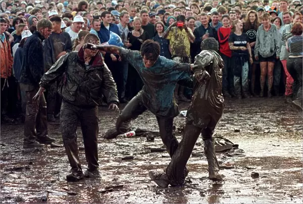 T in the Park July 1997 People mud fighting at T in the Park at Balado Airfoeld near