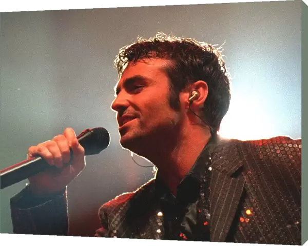 Marti Pellow of Wet Wet Wet of stage singing at the SECC Glasgow