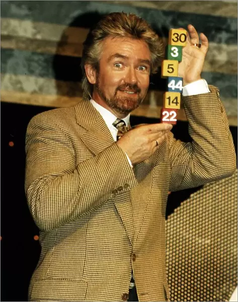 Noel Edmonds Tv Presenter with some National Lottery numbers