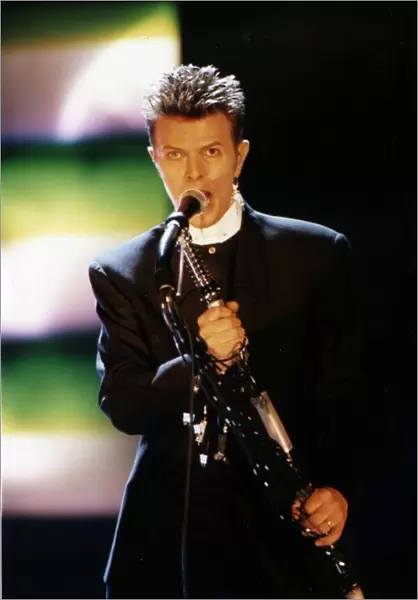 David Bowie Singer Songwriter at the Brit Awards 96 Wearing black suit singing