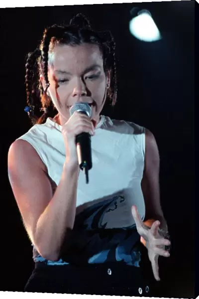 Bjork singer from Iceland on stage at the Irvine Festival with microphone in hand