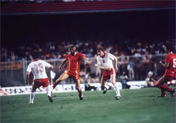 Poland v Belgium 1982 World Cup Luc Millecamps of Belgium is challenged by