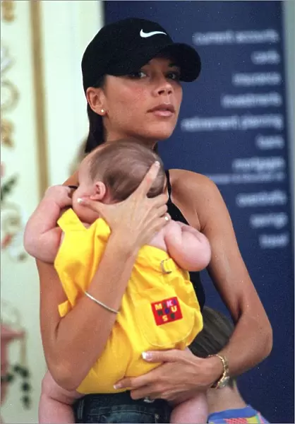 Victoria Adams ('Posh Spice') out shopping with baby Brooklyn in Trafford