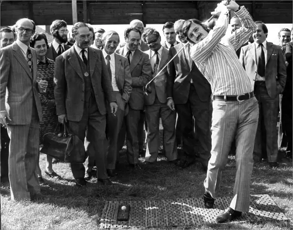 Jimmy Hill swings into action to open the golf driving range at Packington Park