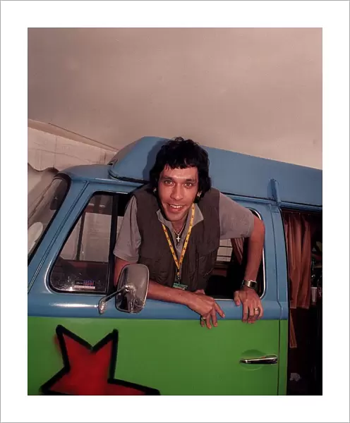 Rick Witter lead singer of Shed Seven at T in the Park hanging out of a van July 1999
