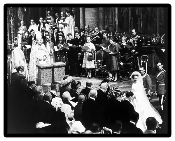 Princess Anne standing at the altar at her wedding to Mark Phillips with her father