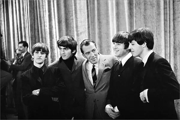The Beatles with television host Ed Sullivan during their visit to the USA February 1964