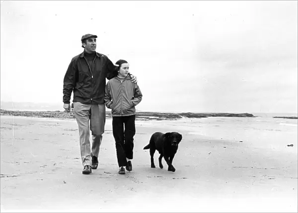 Sunderland Associated Football Club - Bob Stokoe walking along the beach with his