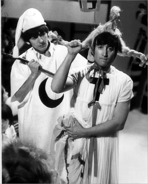 John Lennon and George Harrison rehearse for Around the Beatles tv spectacular 28 April