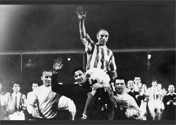 Sir Stanley Matthews is carried from the pitch in celebration following his testimonial
