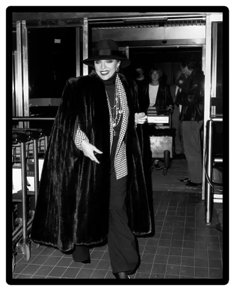 Joan Collins Actress at Heathrow Airport