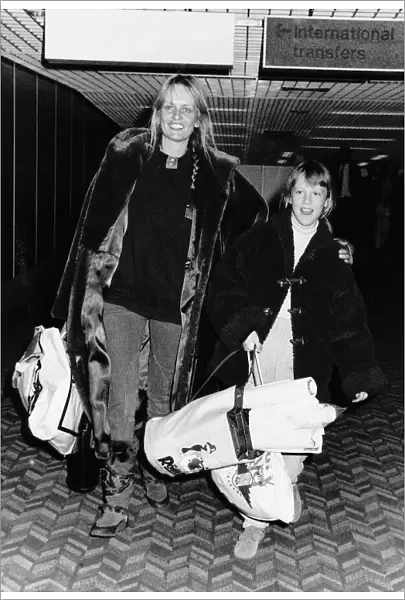 Twiggy Model Actress arriving at Heathrow Airport airport with daughter Carly