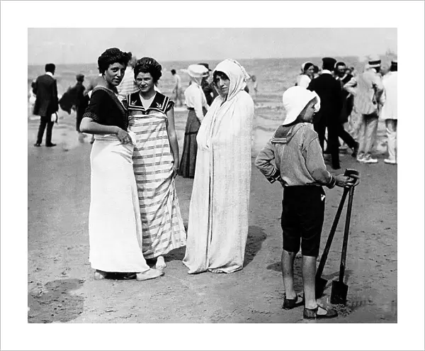 Bathers at Norderney France modelling fashion on a beach in 1911 Wearing beach