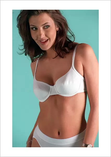 Model wearing white bra and knickers from Marks and Spencer