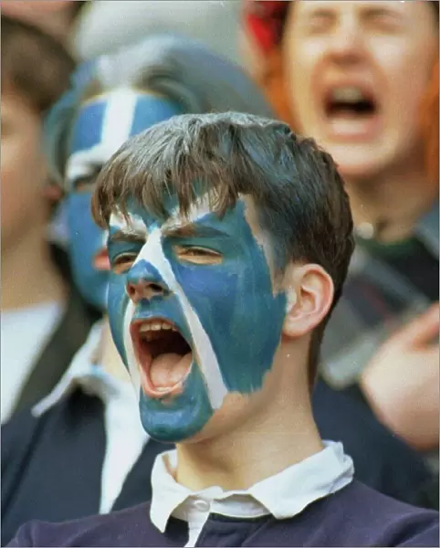Scotland supporter shouts encouragement to rugby team during international against