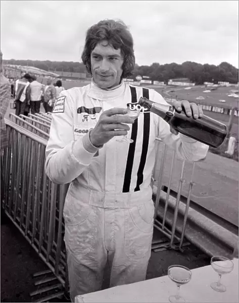 Tom Pryce, racing driver. Won 100 bottles of champagne for the fastest lap in