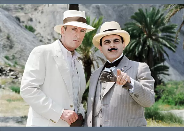 David Suchet as the famous Belgian detective Hercules Poirot (right