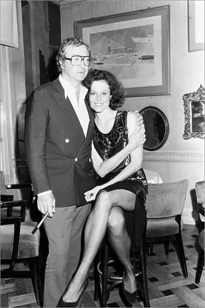Actor Michael Caine with actress Sigourney Weaver at Langhams restaurant, London