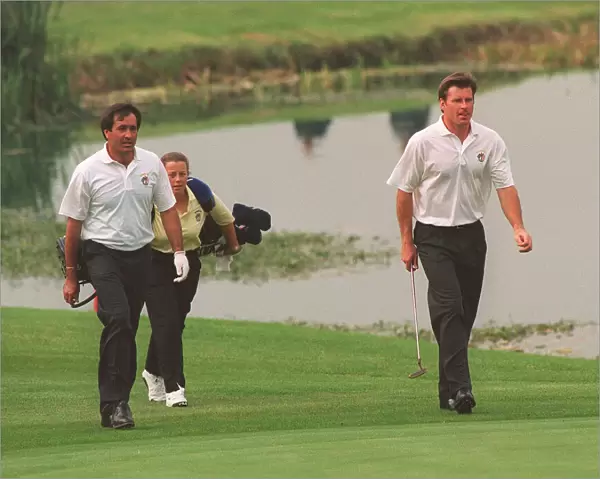 Ryder Cup Europe v USA September 1993 Nick Faldo golfer walks with his partner in