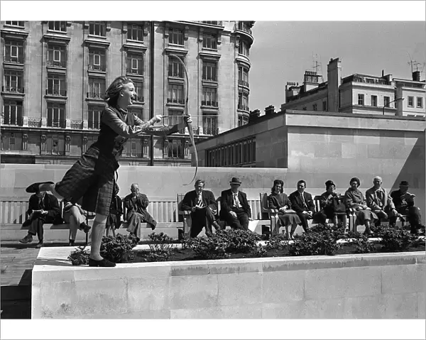 Fashions taken during London Fashion Week 1964 Model wearing a tartan skirt