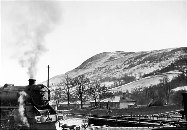 Steam train leaves Blair Atholl on the railway route from Perth northwards to Forres in