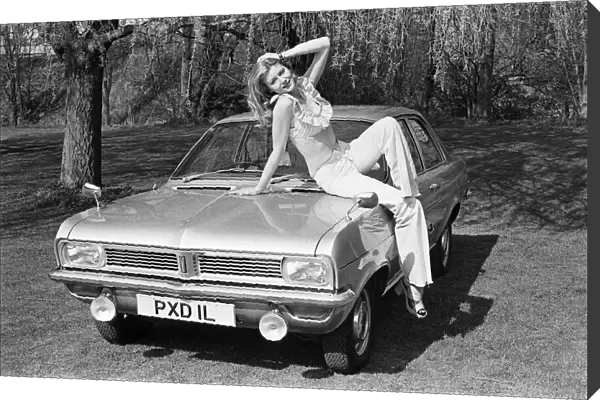 Reveille model Lia seen here posing with a Vauxhall Viva car which is a top prize in