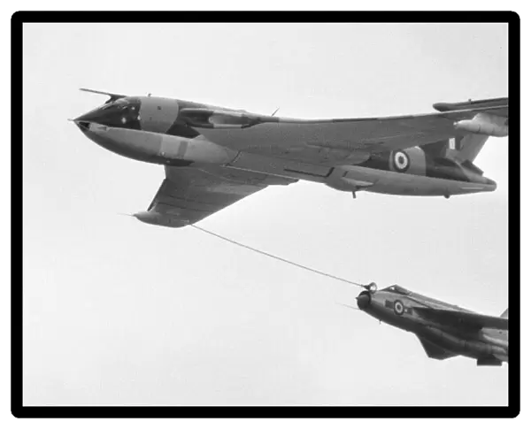 A Vickers Victor tanker aircraft refuelling an English Electrics Lightning seen here