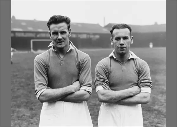 Leicester City footballer Don Revie (left) poses with teammate Alex Scott during a