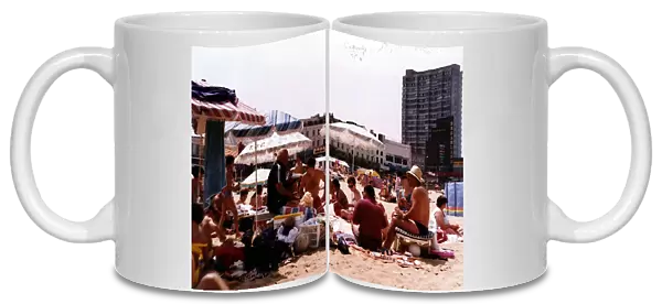 Britain Places : Margate, Kent. Holidaymakers relaxing on the beach at the seaside resort