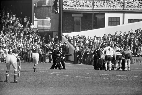 Fulham 1 v. Stoke 1. 1966 League campaign Players cluster around Cohen as