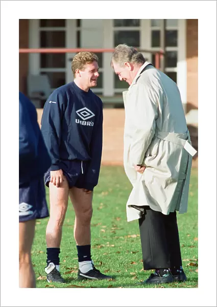 England footballer Paul Gascoigne joking around with coach Lawrie McMenemy at their