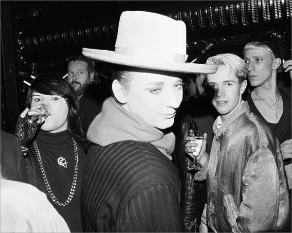 Culture Club singer Boy George attending a reception with Radio One DJ Janet Long