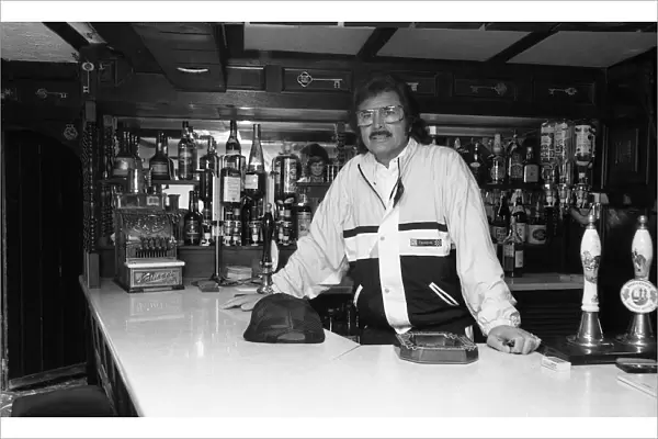Engelbert Humperdink behind the bar of his own pub at his home near Leicester