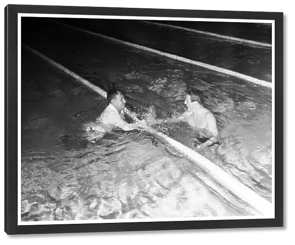 Ian MacIntosh Black, Scottish swimmer, pictured with coach, at the Empire Games, Cardiff