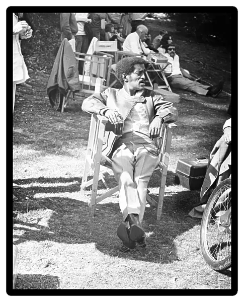Sammy Davis Junior takes a break from filming at Eastnor Castle Ledbury