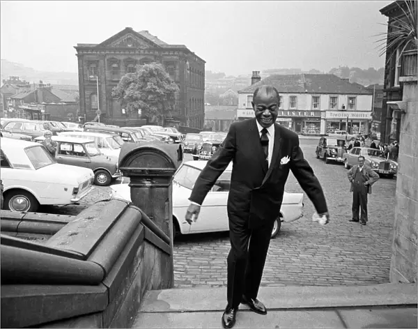 Louis Armstrong seen observing an old Batley tradition. Touching the Yorkshire Mills