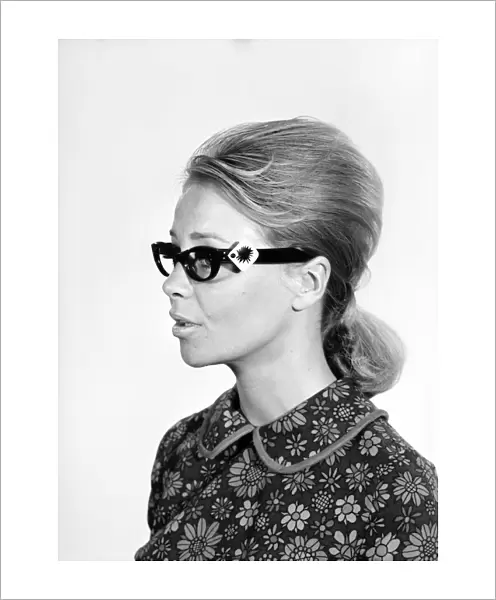 Clothing: Fashion: Spectacle Frames: Woman seen here modelling the latest fashionable