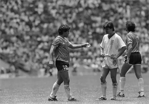 Diego Maradona (left) seen with Steve Hodge during the England v Argentina Hand of God