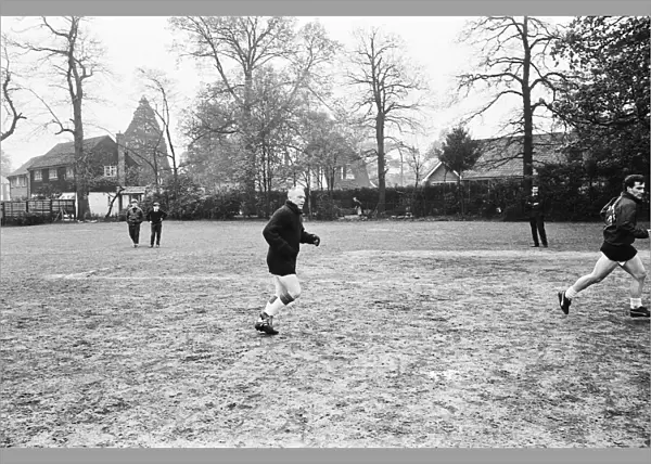 Liverpool manager Bill Shankly takes charge of a team training session at Weybridge one
