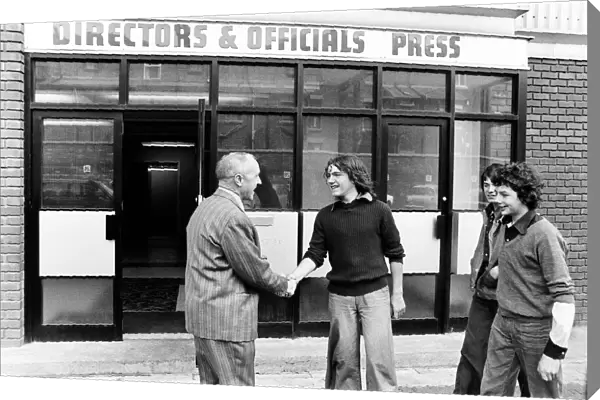 Liverpool manager Bill Shankly greets young fans outside the directors office at Anfield