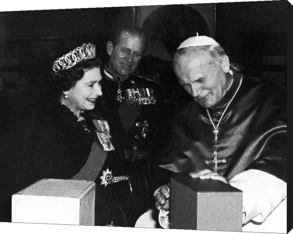 The Queen with the Duke of Edinburgh are pictured with Pope John Paul II during a State