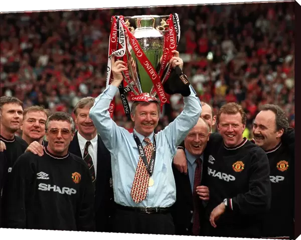 Alex Fergusonwith the Premiership trophy May 1999 on his headafter his Manchester