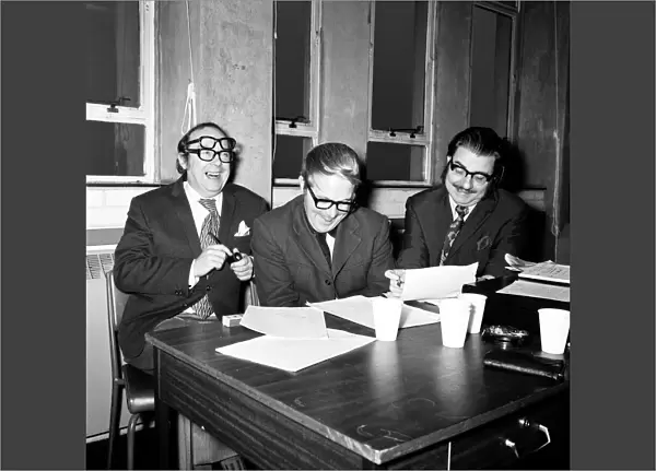 Eric Morecambe and Ernie Wise, pictured with BBC producer and director John Ammonds