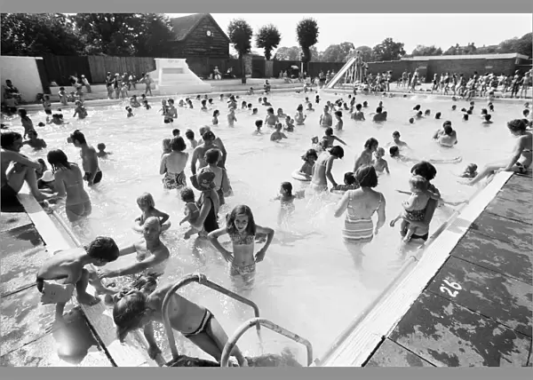 People try to keep cool at a Birmingham lido during the summer heatwave of 1976