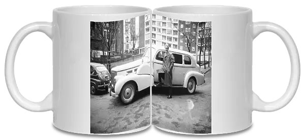 Rupert Lycett Green seen here with his vintage Cadillac. 15th February 1968