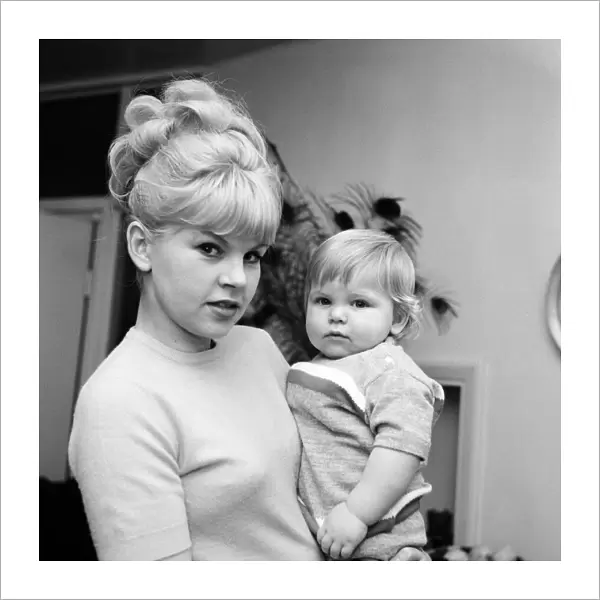 Perrin Lewis, wife of singer Vince Holden, pictured with their son Ty Holden