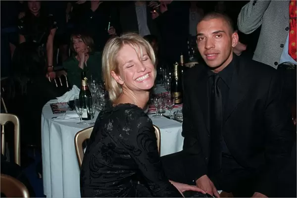 Ulrika Jonsson TV Presenter February 98 At the Britt awards sitting with boyfriend